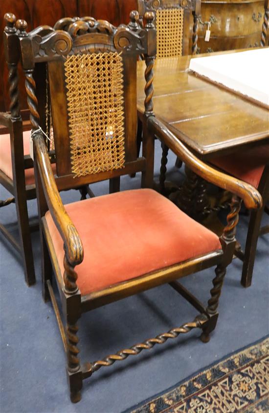 A set of six 1920s Carolean design carved beech dining chairs (2 with arms)